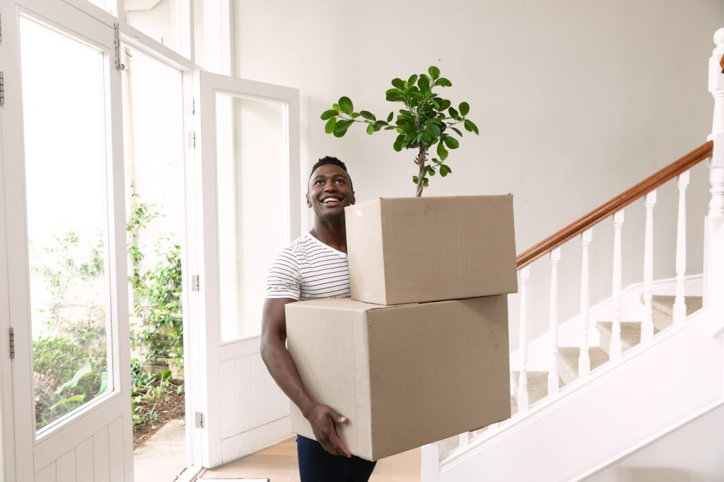 Man moving in to a new home